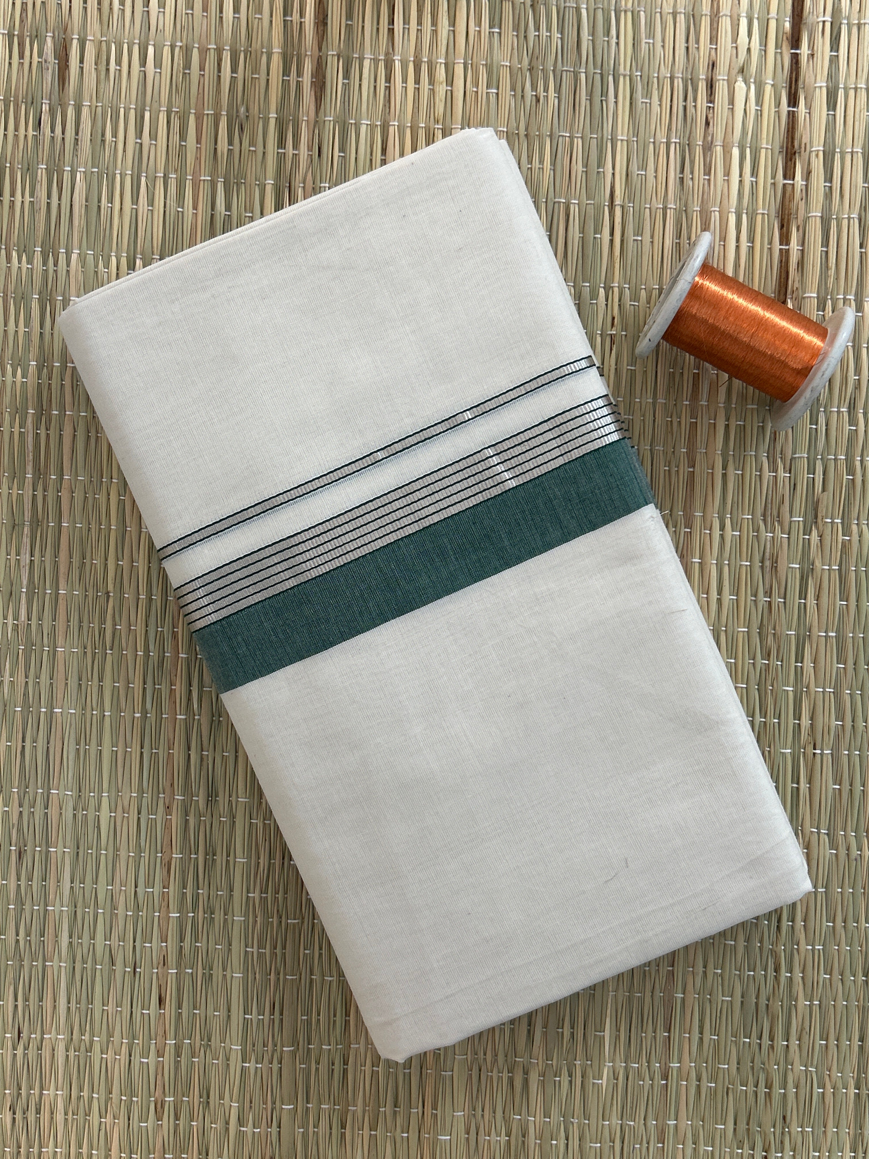 Green and Silver Zari Border-White Handloom Dhothi